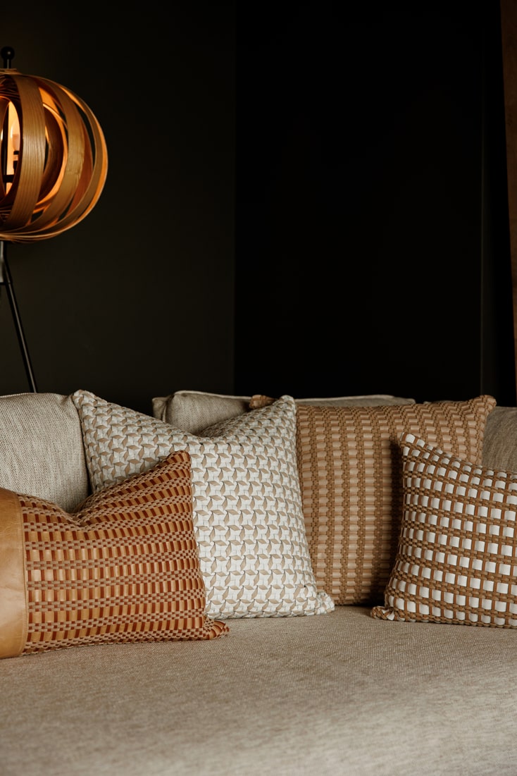tressera leather cushions scattered on a couch